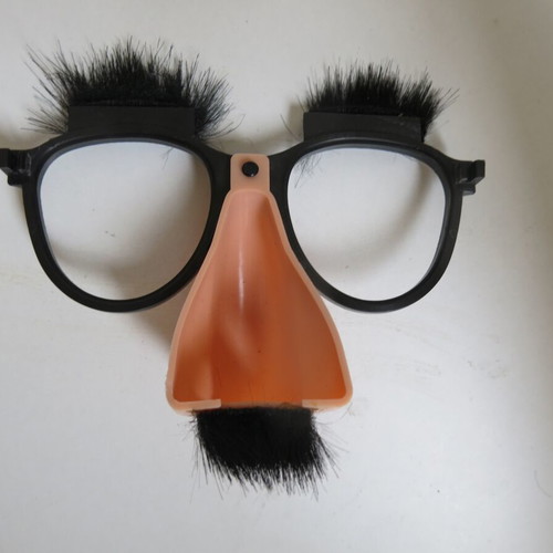 Carnival glasses with nose, eyebrows and mustache used