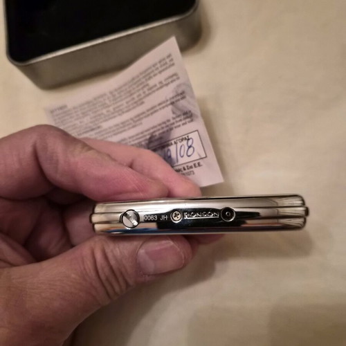 Ronson lighter like new with purchase tag