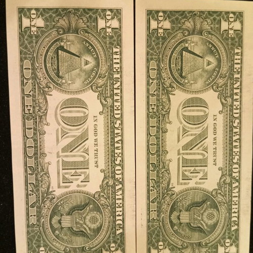 Dollars with consecutive numbers new, perfectly glued