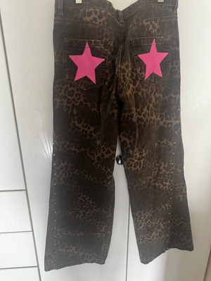 Bershka leopard print pants with pink stars like new size 36