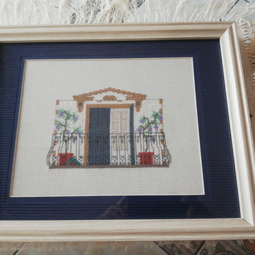 Embroidered textile painting with wooden frame