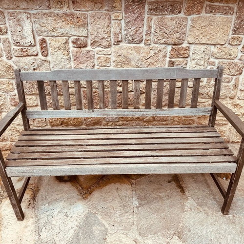 Outdoor bench used, made of solid teak wood