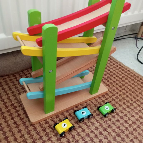 Wooden toy like new with small cars