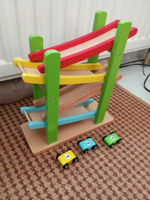 Wooden toy like new with small cars
