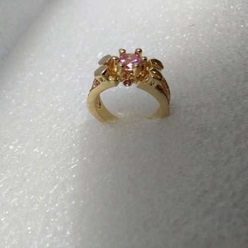 Ring with pink stones like new, gold plated size 6