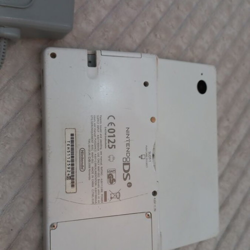 Nintendo DS used with original charger, no stylus