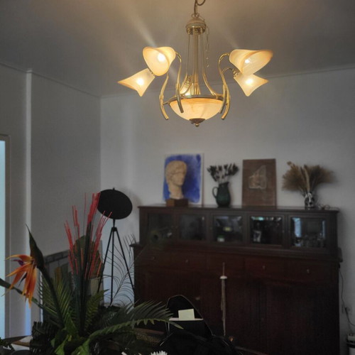 Ceiling chandelier used with handmade glass and bronze