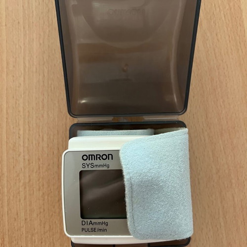 Omron digital wrist blood pressure monitor used