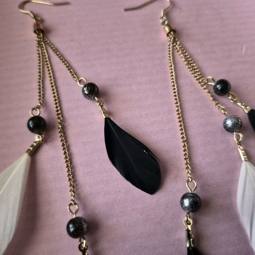 Boho feather dangle earrings like new, black and white