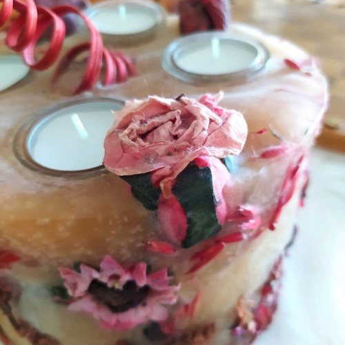 Decorative candle with dried flowers used