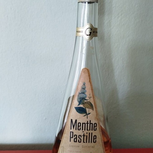 Giffard Menthe Pastille liqueur bottle used, triangular glass shape