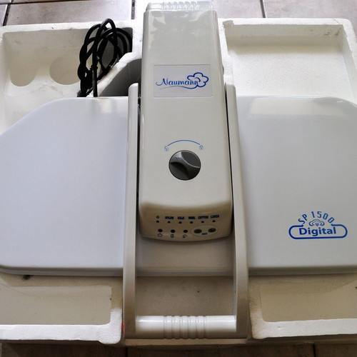 Naumann SP 1500 steam press used for ironing