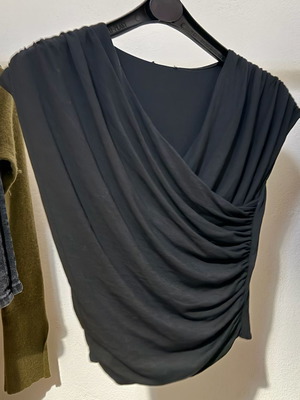Women's black blouse with draped neckline and pleats used, size S