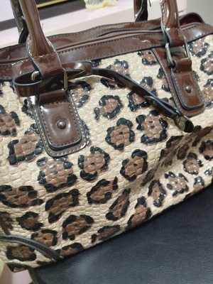 Handbag with leopard pattern and brown details like new