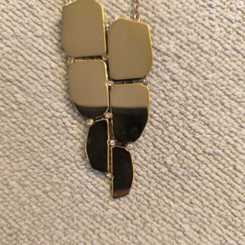 Folli Follie long necklace like new, gold tone with geometric detail and strass
