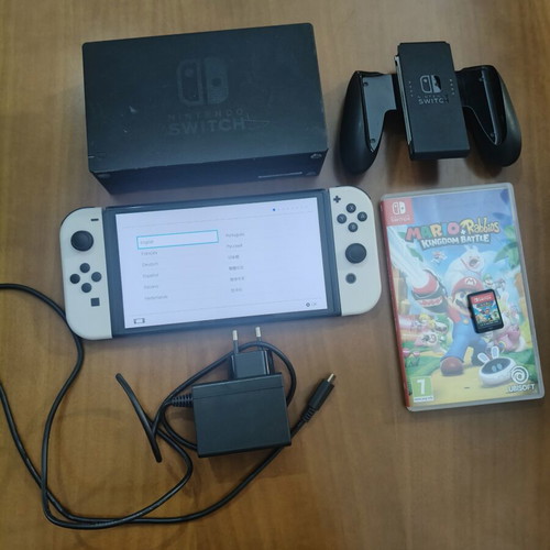 Nintendo Switch OLED white with Mario and Rabbids Kingdom Battle game