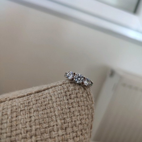 Trilogy silver plated ring used with zircon and heart motifs