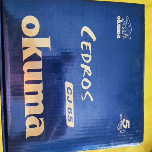 Okuma CJ 65 Cedros fishing reel new with accessories
