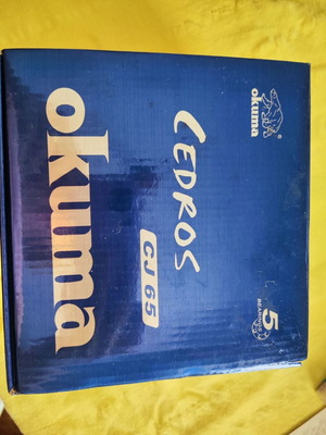 Okuma CJ 65 Cedros fishing reel new with accessories