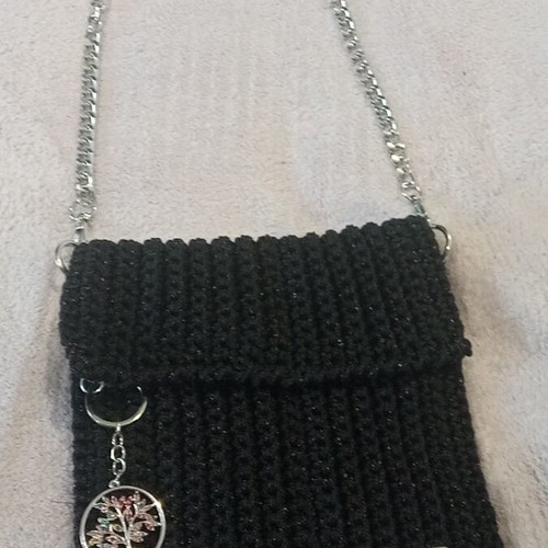 Handmade knitted black evening shoulder bag with silver chain and decoration