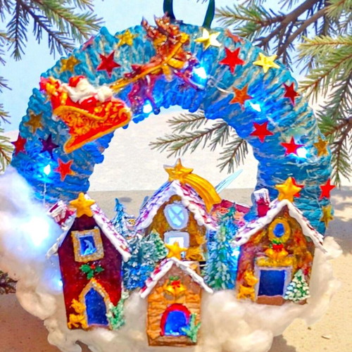 Handmade wreath Santa Claus with sleigh in Christmas village lit with LED