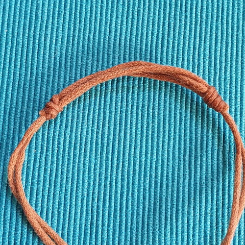 Adjustable bracelet used with brown and multicolor crystals