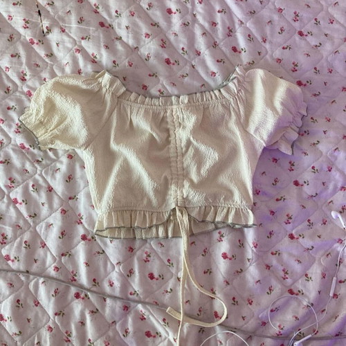 Cream top size M unused in excellent condition