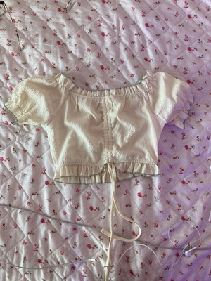 Cream top size M unused in excellent condition