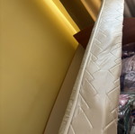 Bed with lifting mechanism