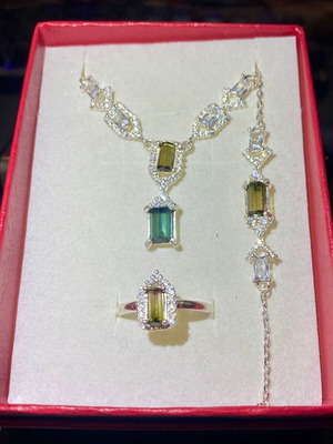 Handmade silver set with natural olive green, indicolite tourmaline, topaz & moissanite