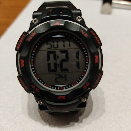Q&Q wristwatch used with new battery and broken strap, black