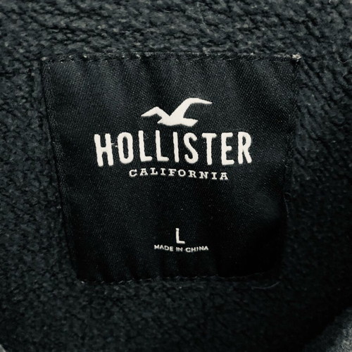 Hollister sweatshirt used, black with hood and zipper, size L