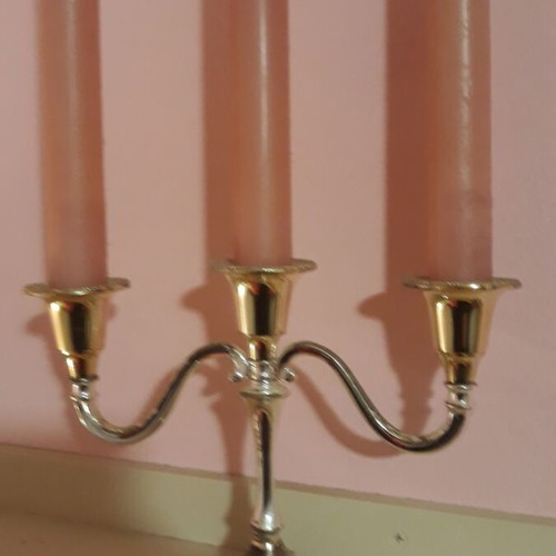 Metal candlestick like new with candles