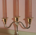 Metal candlestick like new with candles