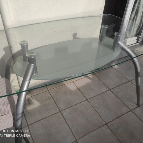 Dining set with 4 chairs used, glass top
