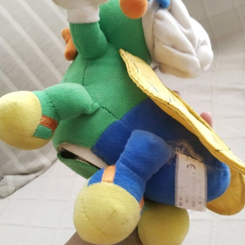 Stuffed doll used, collectible, needs maintenance