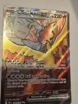 Team Rocket's Moltres ex Pokémon card like new