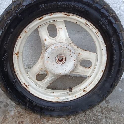 Honda Dio 50 rear rim used with Bridgestone tire