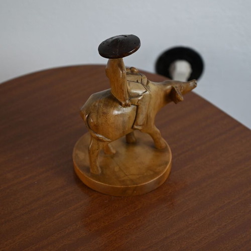 Handmade wooden sculpture farmer on buffalo, height 17 cm, like new