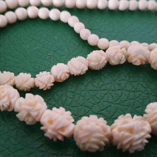 Vintage carved bone necklace with rose details