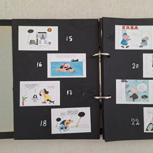 103 Cartoons by Kyr and 8 Cigarette Papers in Folder used