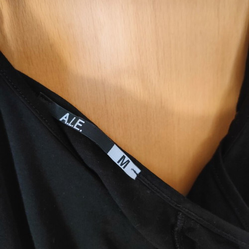 A.L.E. dress medium with black slip, like new