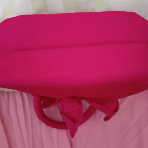 Pink handbag with zipper and handles