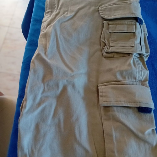 Timberland men's beige pants with 6 front and 2 back zip pockets, size 34