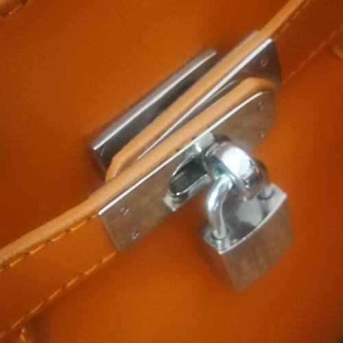 Frederic T Paris leather shoulder bag with padlock used orange