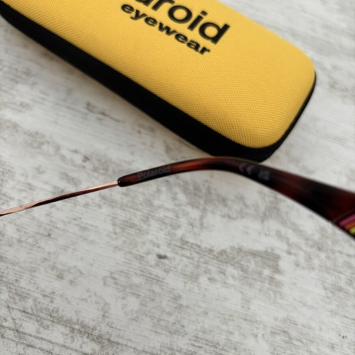Polaroid sunglasses like new, black metal frame