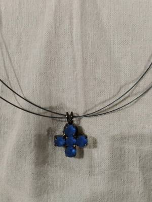 Cross pendant with blue transparent stones like new, unused