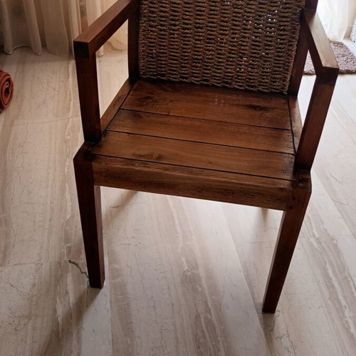 Armchair made of solid wood with woven coconut back like new