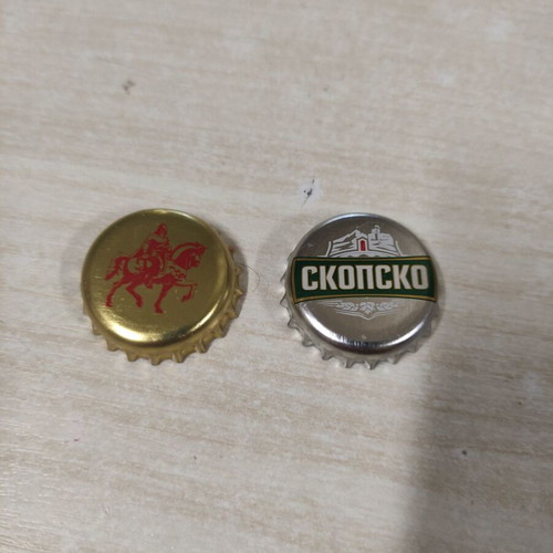 Two used beer caps from Skopje breweries Krali Marko and Skopsko