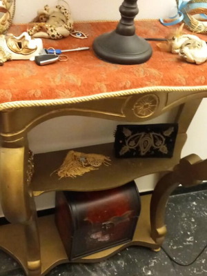 Baroque style entryway table with gold-bronze finish